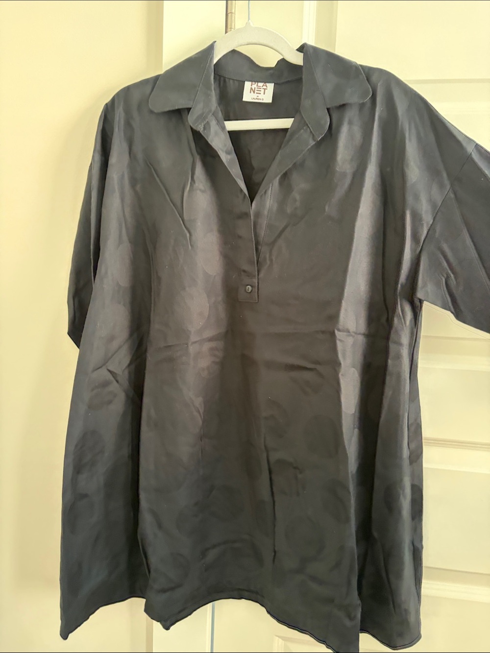 Planet Black on black Polka dot tunic. Bracelet length sleeve- with pockets.